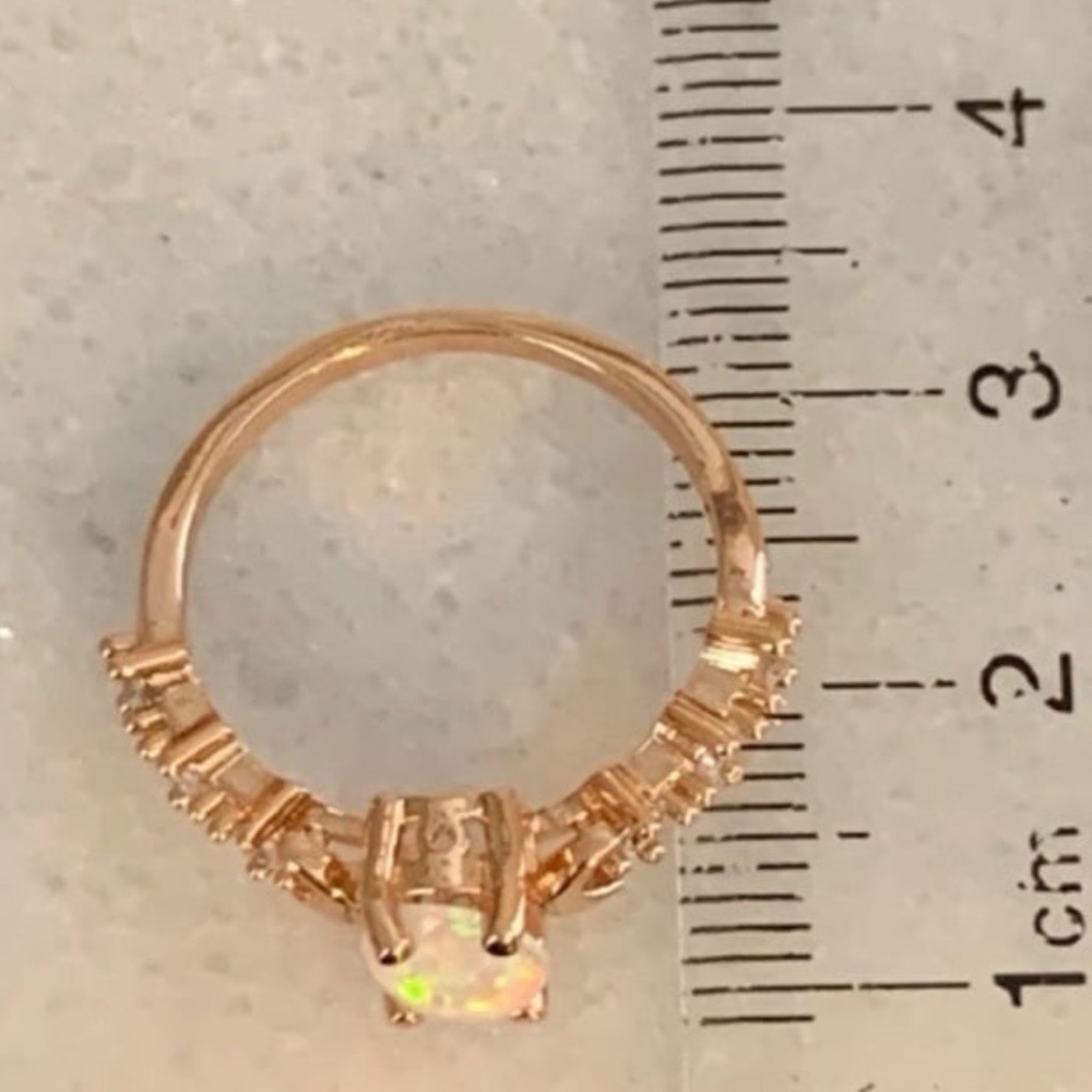 Rose Gold Opal Moon Crystal Ring Size 7 Brand New

Brand New - Picture 3 of 6